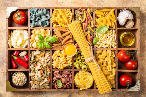 istock Assorted colorful italian pasta in wooden box 1178931147