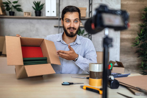istock Vlogger making social media video about books 1178932132