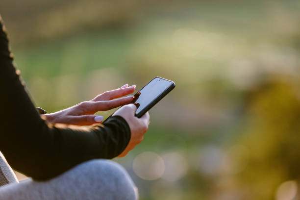 istock Sporty woman using phone 1178933764
