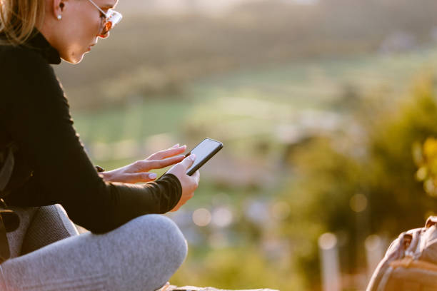istock Sporty woman using phone 1178933808
