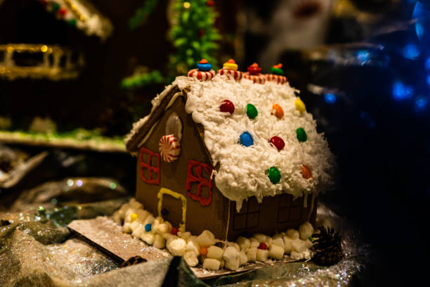 istock Christmas decorations against blurred background. Ginger house with candies. 1178934084