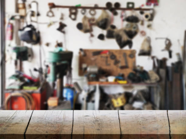 istock blur background parts and tools on the desktop in the garage 1178934788