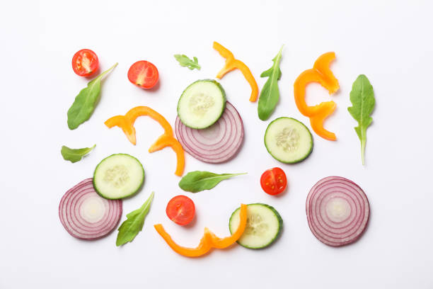 istock Fresh vegetables slices on white background, top view 1178943183