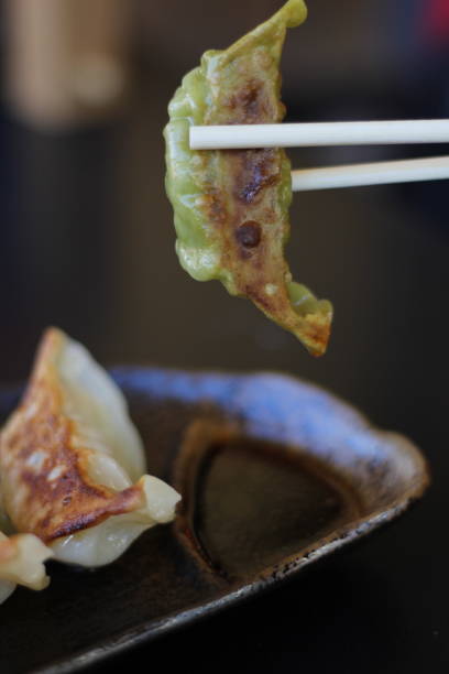 istock Gyoza snack with soy sauce 1178943338