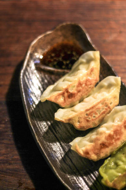 istock Gyoza snack with soy sauce 1178943634