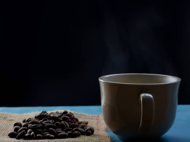 istock Hot coffee in glass and coffee beans. 1178944517