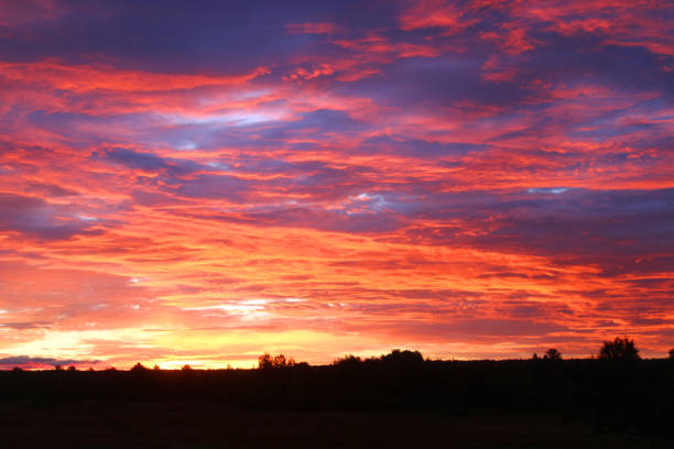 istock Vibrant, spectacular, vivid sunrise sky 1178945716