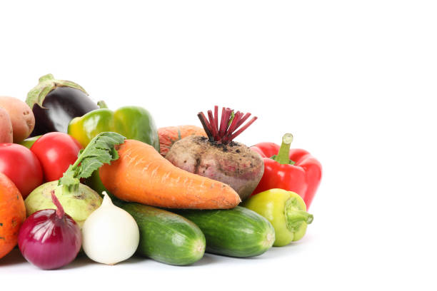 istock Composition with ripe vegetables isolated on white background 1178946267