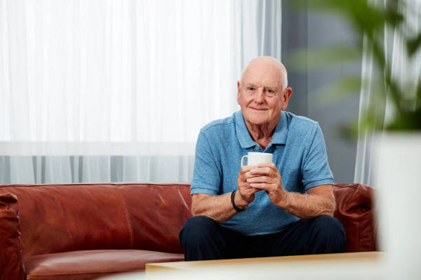 istock Senior man with a cup of coffee at home 1178946406