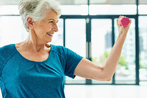 Cropped shot of a senior woman doing strengthening exercises