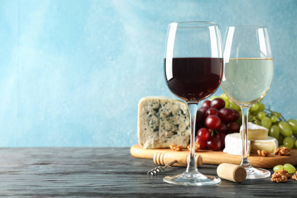 istock Grape, cheese, corkscrew, glasses with wine, on wooden background, copy space 1178948673