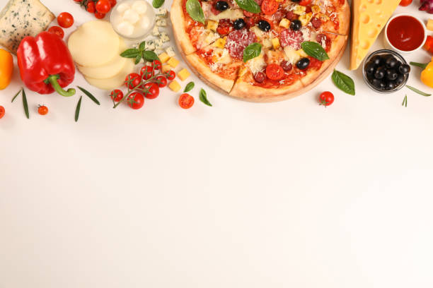 istock Flat lay. Pizza and ingredients: vegetables, cheese on white background, copy space 1178949018