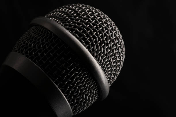 istock Close up head audio microphone in black background with copy space on the right 1178949070
