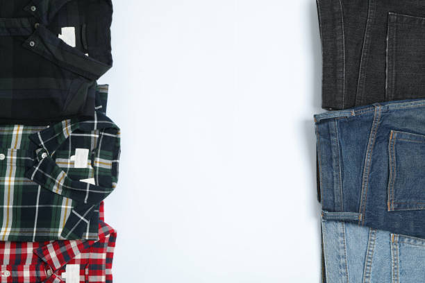 istock Flat lay with shirts and jeans on white background 1178950202