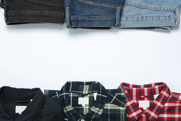 istock Flat lay with shirts and jeans on white background 1178950860