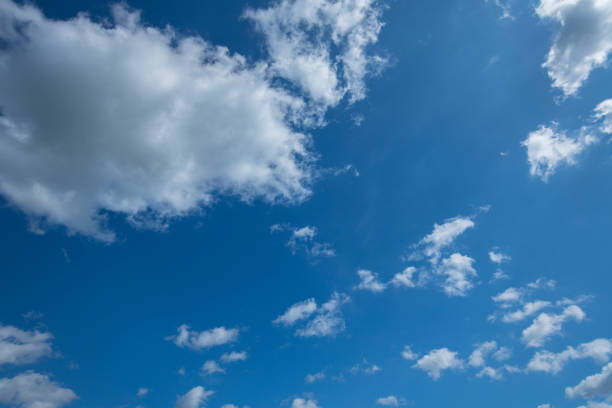 Beautiful background. White clouds in the blue sky.