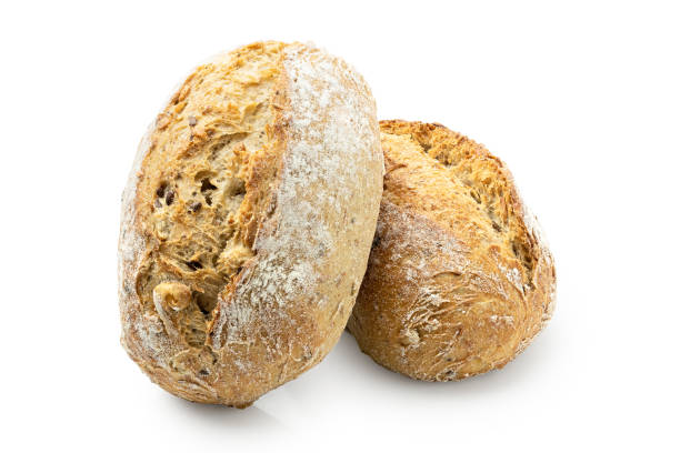 istock Two whole grain french bread rolls isolated on white. 1178954501