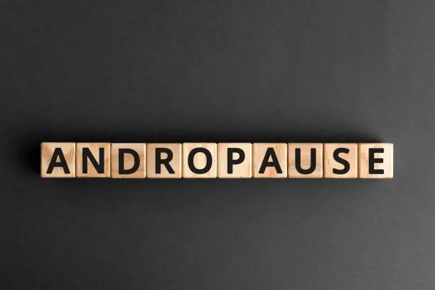 Photo of Andropause - word from wooden blocks with letters