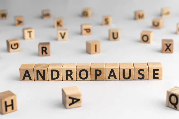 Photo of Andropause - word from wooden blocks with letters