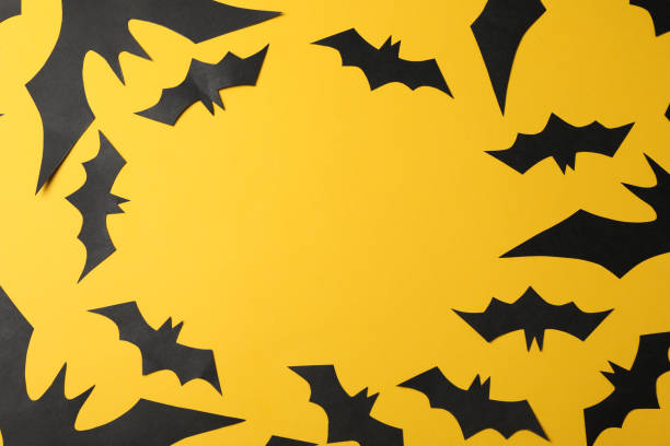 istock Decorative black bats on color background, copy space 1178958862