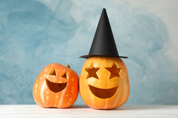 istock Funny pumpkins on white wooden background, space for text 1178959074