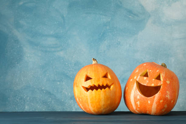 istock Halloween pumpkins on wooden background. Space for text 1178959207