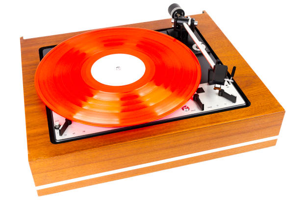 istock Vintage turntable with a red vinyl isolated on white 1178960845