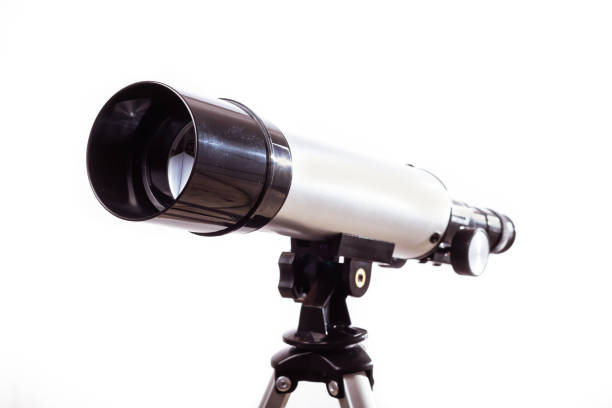 istock telescope on a white background laid on wooden board 1178960865
