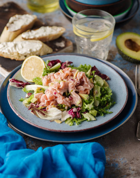 istock Ceviche is a traditional dish from Peru. Salmon marinated in lemon with fresh lettuce, avocado and onions 1178961434