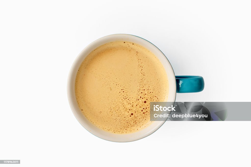 Cup of coffee with foam top view on white background Bulletproof Stock Photo