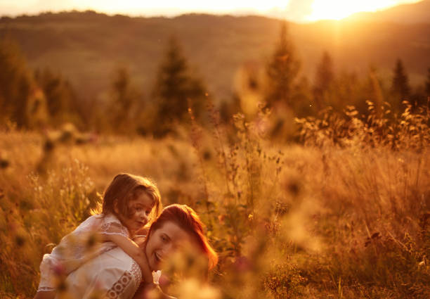 istock Piggy back ride at sunset 1178964785