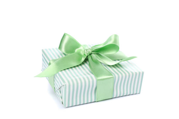 istock Gift box with green bow isolated on white background 1178964789