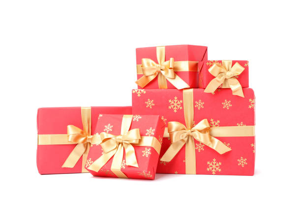 istock Gift boxes with golden bow isolated on white background 1178964906