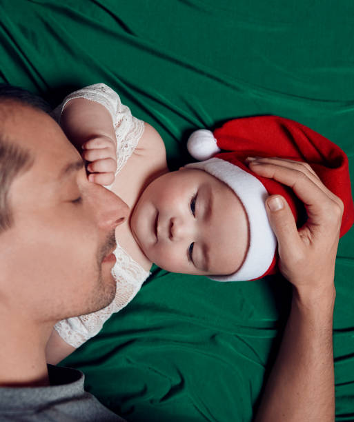 istock Christmas moments between father and daughter 1178965257