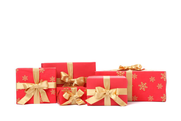 istock Gift boxes with golden bow isolated on white background 1178965362