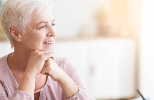 istock Side shot of beautiful senior lady looking aside 1178966324