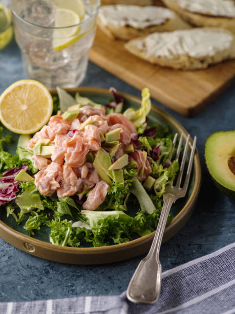 istock Ceviche is a traditional dish from Peru. Salmon marinated in lemon with fresh lettuce, avocado and onions 1178966889