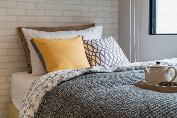 istock modern bedroom with set of pillows 1178978291