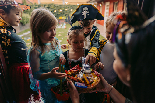 Group of kids trick or treating