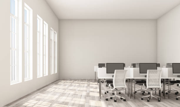 istock Interior of modern white office with rows of white computer tables with white chairs, wooden floor. 3d rendering 1178985560