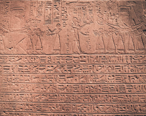 istock egypt hieroglyphs carved on the stone 1178985626