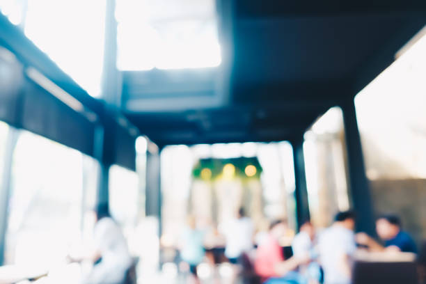 istock Blurred people working and recreation in modern cafe 1178990778