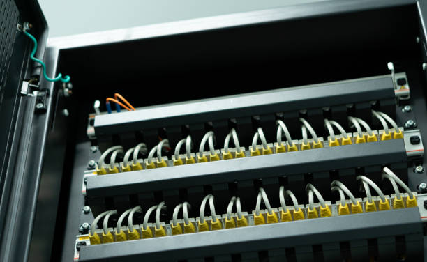 istock Network ethernet cables connect to switch server rack in data center hub of university 1178995158