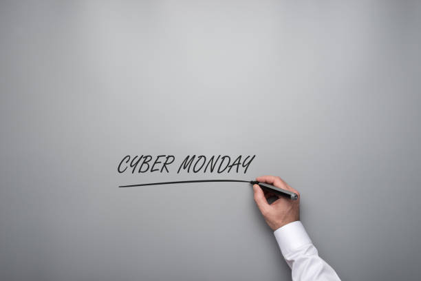 istock Male hand writing a Cyber monday sign 1178995400