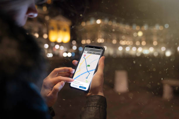 istock A woman is looking at a map on her mobile phone 1178997848