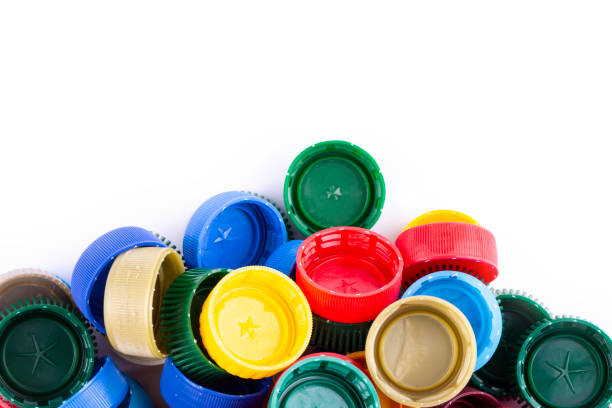 istock multicolored plastic bottle caps are scattered on a white background 1178999814