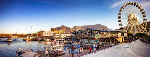 Cape town panoramic view of Victoria and Albert waterfront with table mountain stock photo