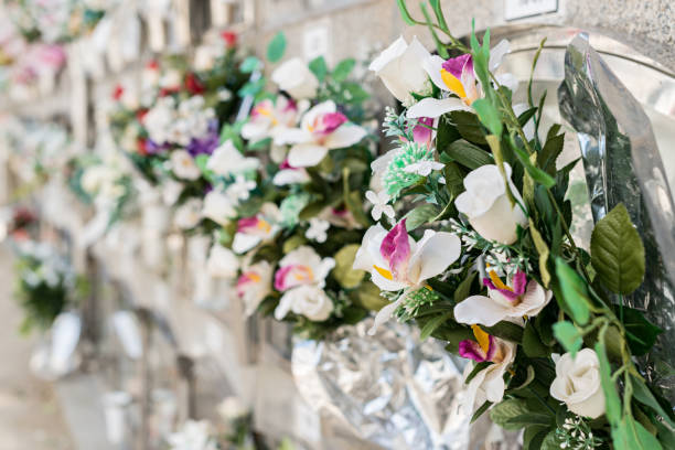 istock Flowers in a cemetery 1179003928