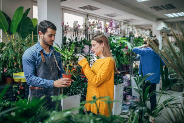 istock People at the flower shop 1179004317