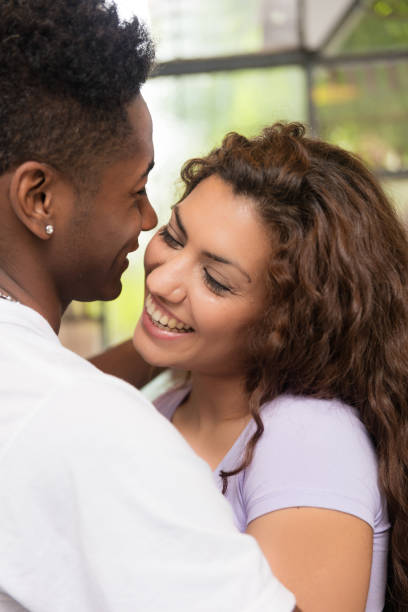 istock Young beautiful interracial couple in love 1179005702
